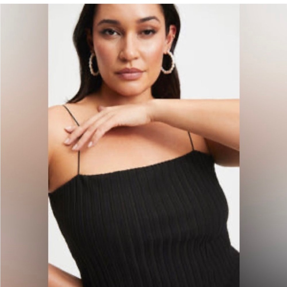 Good American wide tube tank size 4. NWT